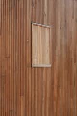 The slatted cladding on the Minima is made from rough sawn timber with tinted sealer. The windows are also framed in timber and come with a fly screen backing.