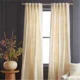 These airy curtains are made from pure 100 percent raw silk, invoking an opulent, yet approaching style. The elegant pleated design adds a touch of sophistication to any space, all while keeping the sunlight out for uninterrupted rest.