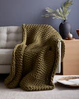 Quince’s soft-knit jersey blanket feels just like a warm hug, adding 15 lbs of added weight to calm anxiety and quell any winter-induced blues.