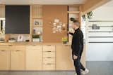The kitchen in Cutwork’s modular prefab PolyRoom for Bouygues Immobilier with concealable, stowable sink and tap and plywood millwork cabinetry.