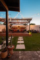 In the backyard, the couple added a pergola and outdoor dining space for $6,000.