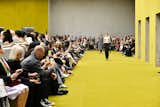 Gucci’s Fall/Winter 2023 fashion show featured wall-to-wall carpeting in avocado green.