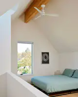 A bedroom loft is upstairs. “The first level is much more connected to the garden and the community, but upstairs, we envisioned it as being a nest where you could get away,” Sonja says.