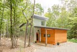 The two interlocking volumes with shed roofs create an unexpected form.  Photo 16 of 72 in House by Carolyn Lochhead from Budget Breakdown: Their Maine Property Only Had One Bathroom, So They Built a Guesthouse for $208K