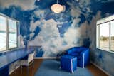 Ring also designed the custom cloud wallpaper, which envelops the home office.