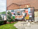 A mural by Baltimore artist SHAN Wallace overlooks Good Neighbor’s outdoor space.  Photo 4 of 8 in One Night in a New Boutique Hotel From Baltimore’s Most Beloved Design Shop