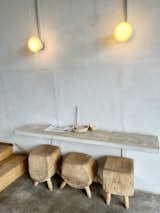 The small seating area at Clavel, a mezcaleria and taqueria in Baltimore’s Remington area, features marshmallowesque paulownia stools carved by local woodworker Kenny Johnston.  Photo 5 of 8 in One Night in a New Boutique Hotel From Baltimore’s Most Beloved Design Shop