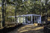 Two Hamptons Cabins Perched on Six Forested Acres Seek $5M