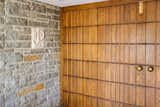 A stone carving that reads “JD 1949” references the home’s original owners, John Rood and Dorothy Bridgman—and, as luck would have it, current owners John and Debby Christakos, too.