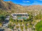 The 1960s home is surrounded by Palm Trees, cacti, and mountains, offering a private oasis to reconnect with nature all while being conveniently located to downtown Palm Springs.