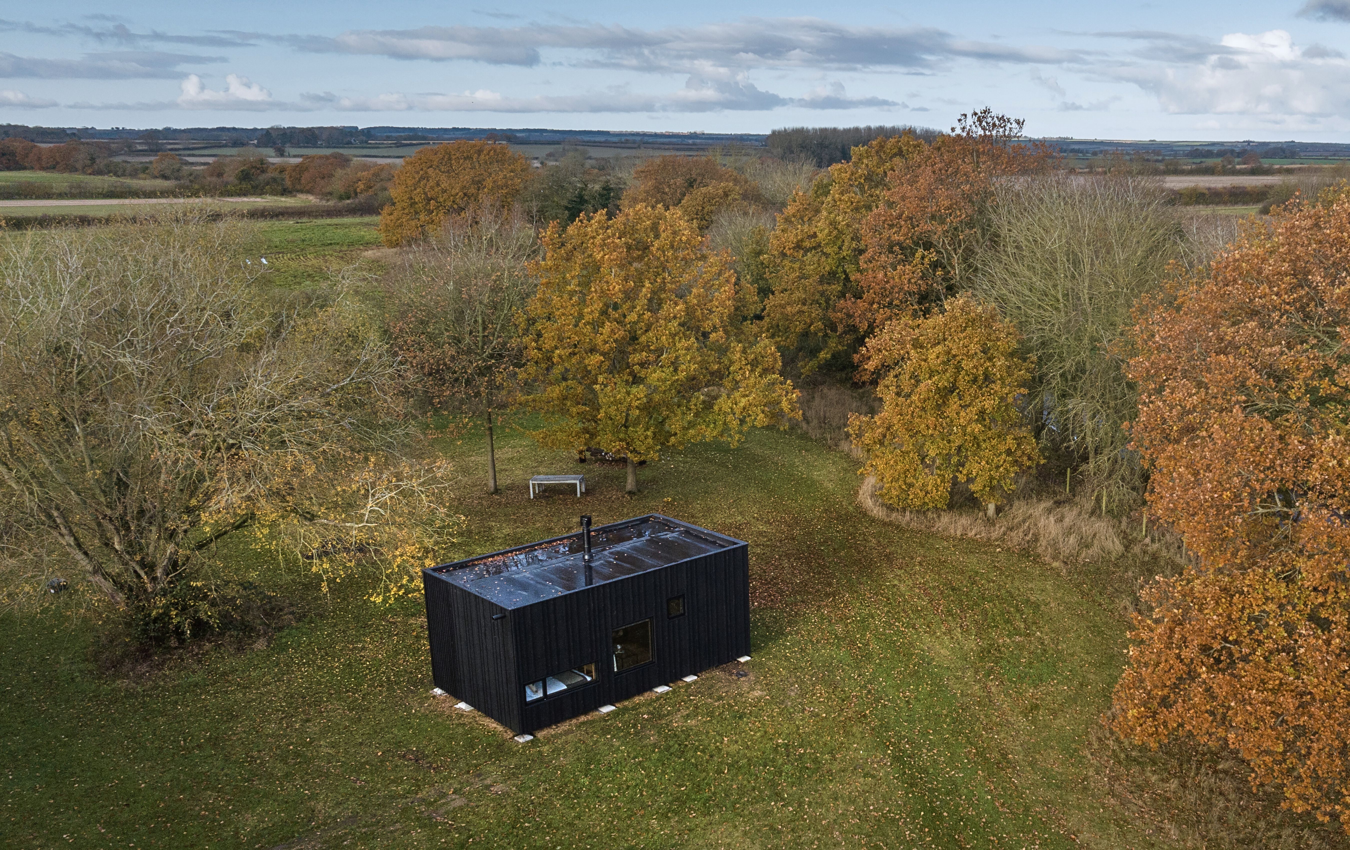 Photo 2 Of 11 In These Tiny “See-Through” Cabins Are Made Of Charred ...