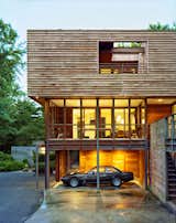 Exterior wood and glass clad house in Palisades New York by Charles P Winter renovated by Rick Cook Fox CookFox.