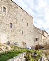 Belgian artist Eva Claessens bought a decaying, 1,000-year-old stone structure in a village in Provence and turned it into a home and studio.