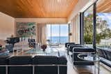Living area in Lake Ontario home by Joseph Storey