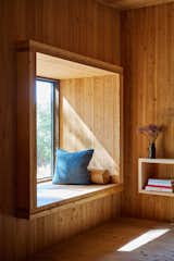 A picture window with a deep seat provides a place to take in the sun.  Photo 9 of 104 in Windows by Emma from Budget Breakdown: An Austin Architect Spins Michael Pollan’s Food Advice Into a Healthy Home