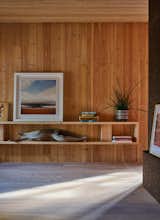 A built-in shelf blends with the CLT wood panels used to create the walls.  Photo 10 of 18 in Budget Breakdown: An Austin Architect Spins Michael Pollan’s Food Advice Into a Healthy Home