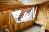 The sauna that connects the two structures, lined in beetle kill pine.  Photo 4 of 5 in He Had a Vision: to Build an A-Frame Cabin Almost Entirely Out of Beetle Kill Pine