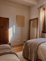 The single beds in the calm and soothing guest room.&nbsp;