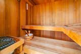 In addition to a large garden patio, the property also has a sauna.
