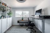 A home office is located down the hall, and another workspace can be found in the newly built detached studio.