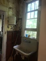Before: The renovation completely updated the home’s original bathrooms.