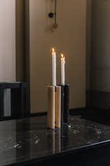Stone candle holders by Polish-born Milan designer Daniel Kolodziejcza included one made from a soft, translucent onyx.