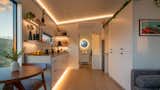The LED valence and strip lights outlining the ceiling, millwork, and windows are characteristic of the tiny homes made by New Frontier Design, who collaborated with Zook Cabins on The Luna.