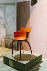 In a bold orange, the Panorama swivel chair by Philippe Starck shares the round shape and slits of the Teresa lamp. Also like the Teresa, it uses recycled materials. The polycarbonate is made with pulp from the paper industry, which is surprising given its sheen.