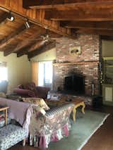 While the owners liked the existing ceiling beams and fireplace, the rest of the living room needed to be updated.&nbsp;