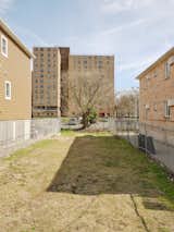 A vacant lot in Edgemere, Rockaway, Queens, New York, between several mid-rises now owned by ReAL Edgemere Community Land Trust, established by Alexis Foote and Zakhia Grant.