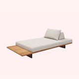 Deck Large Seating Unit by Gloster made out of teak with white cushions and pillows.