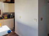 The wall, before.  Photo 2 of 4 in I Tried an “Architectural Wellness Paint” to Transform My Basement Into a Bar