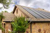 The Timberline Solar shingles don’t require drilling through an existing roof membrane, the way a traditional solar installation does. The water-shedding solar shingles are also designed to withstand winds of up to 130 mph.