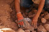 Rylander stacks rocks by hand to build his&nbsp;Animas, New Mexico, home with $50,000.