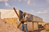 Rylander uses leftover building materials in finds in bulk, giving the home a bit of a fort aesthetic.&nbsp;