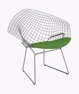 Though Italian-American furniture designer Harry Bertoia didn’t design his 1952 steel wire seating collection in reference to tennis specifically, the Diamond chair’s grid motif evokes the mesh of a net or the wires of a racquet. The bright-green seat pad also reminds of a tennis court.