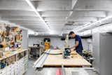The renovation added two bathrooms, a large bedroom, a laundry room, and a workshop.