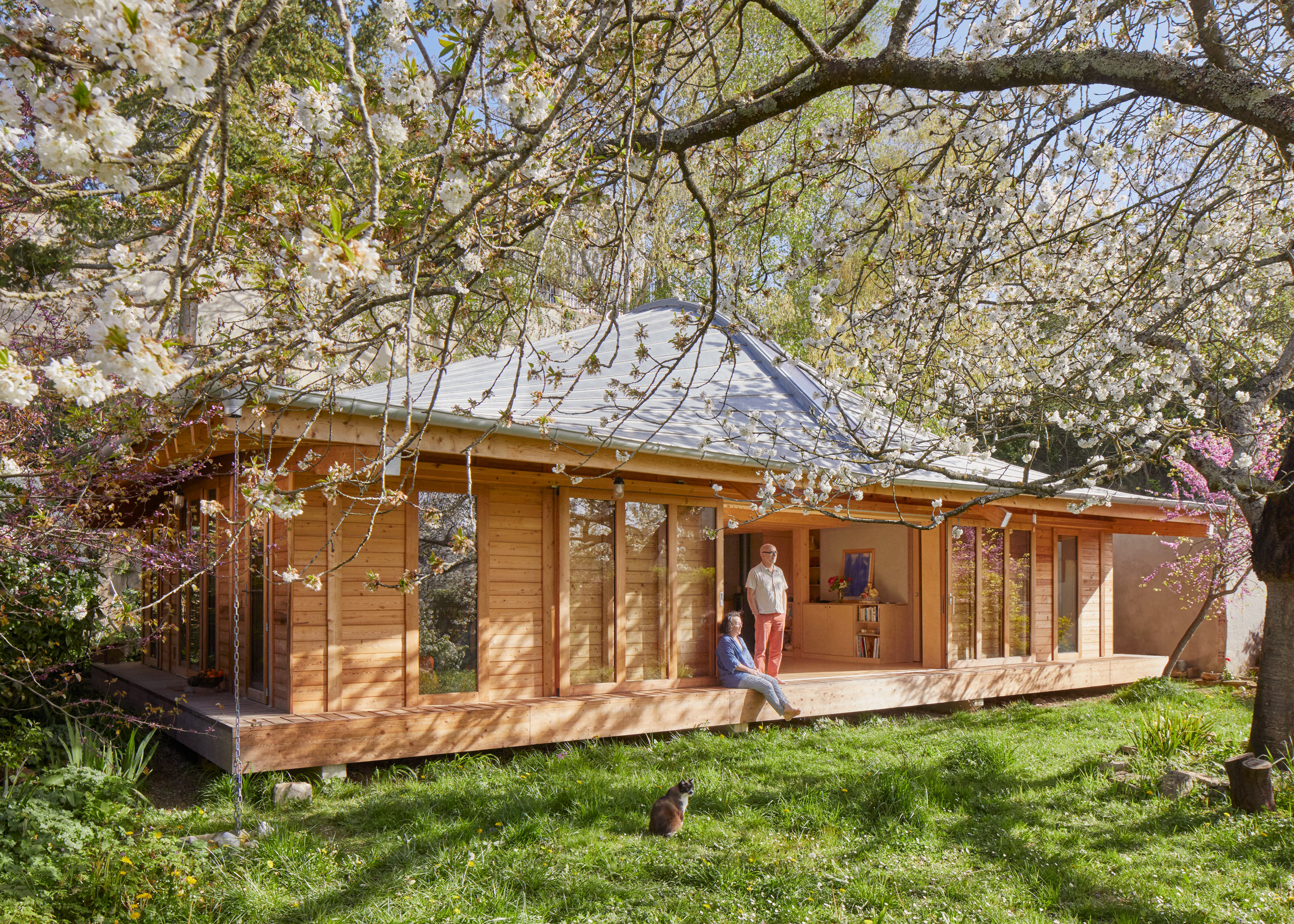 A Swooping Metal Roof Caps a House Set in a Normandy Garden - Dwell
