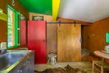 The property also includes a 150-square-foot wooden shed that has been converted into a Corbusier-inspired studio.