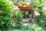 This €740K Brutalist Home Near Paris Is Completely Wrapped in Greenery