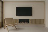 &nbsp;A crackling fireplace—faux, as well—is the centerpice of the living room,