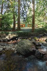 The Sounds of a Creek Fill This $1.4M Midcentury in North Vancouver - Photo 8 of 9 - 