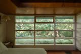 The Sounds of a Creek Fill This $1.4M Midcentury in North Vancouver - Photo 6 of 9 - 