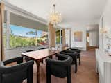 Large picture windows bring mountain views into the dining room.