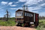 A Tiny Cabin Atop a Pickup Truck Can Handle Snow, Hills, and Seashore