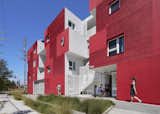 The outdoor circulation areas at  LOHA’s Sun King development in Los Angeles—combined with operable windows and a blazing paint job—prevent the project from being “a generic box,” its architect says, while ensuring the project lives up to its name.
