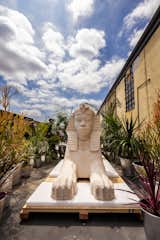 A white sculpture of a sphynx that will be featured in Lauren Halsey’s public sculpture park in Los Angeles, CA, that will act as a community space for Summaeverythang, her nonprofit organization.