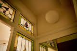 Colors in the home’s original stained-glass windows, which were restored by Brooklyn-based Sunburst Studios, provided palette inspiration.