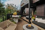 The new outdoor space is divided into two distinct zones: a 75-square-foot grilling zone and an 225-square-foot lounge and dining zone. The lounge area is heated using the Tungsten range, while the grill area utilizes a Platinum Electric heater.