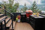  The 75-square-foot grilling zone is open to the elements, and so a different approach to heating was needed. The Bromic Platinum Electric heater was chosen for its durability. 